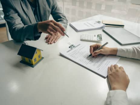 Two people discussing Wills and Trusts